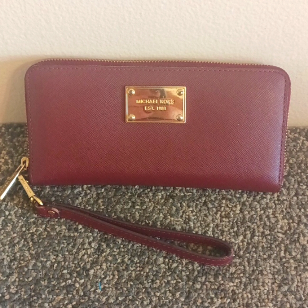 Michael Kors large burgundy leather accordion wristlet wallet